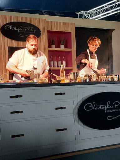 Rebecca Haworth and Jon Appleby competing head to head doing Ready Steady Cook - main stage at the Yorkshire food festival 