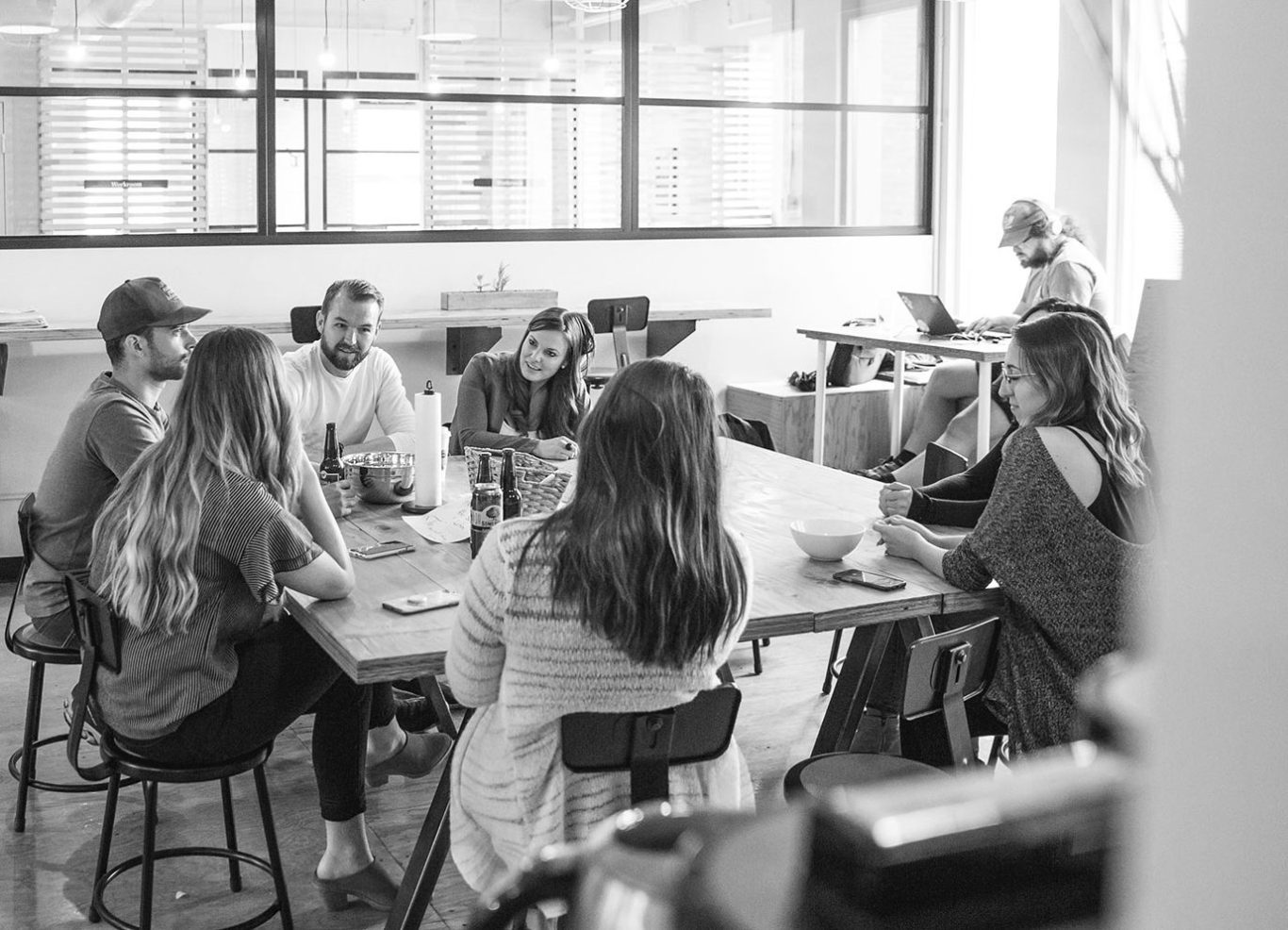 A group of people engaged in sales coach training
